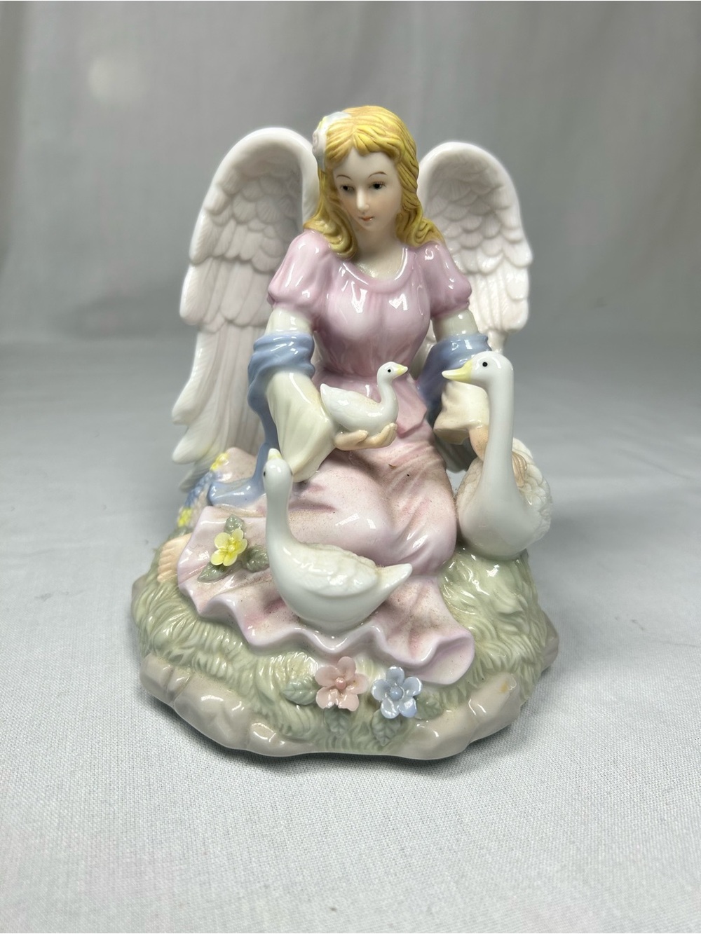 Porcelain Angel Figurine with Pastel Pink Dress and White Swans with music